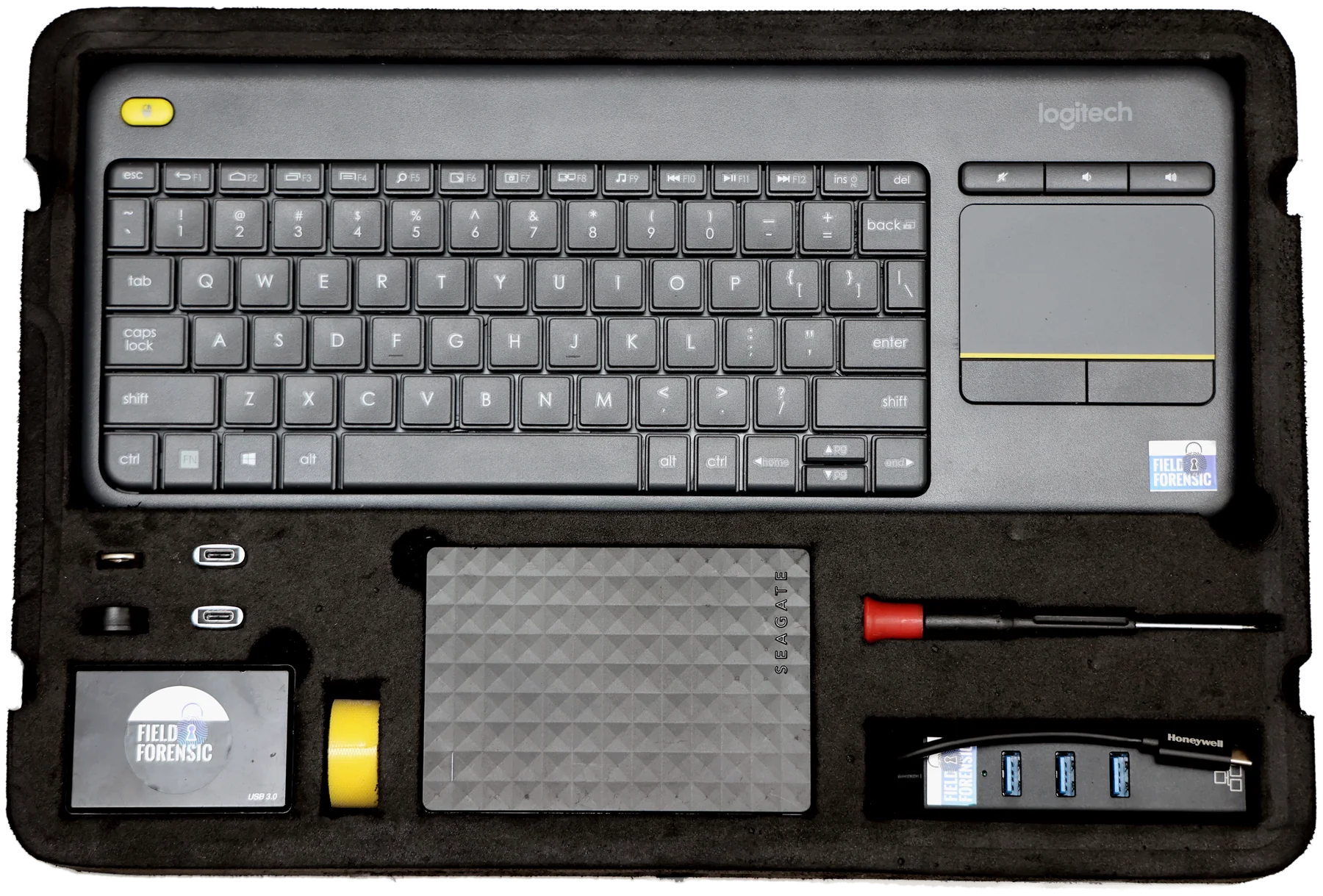 Field Forensic Pro accessories kit — keyboard, Seagate HDD, USB drives and multi card reader